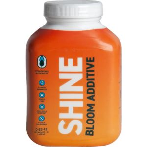 Orange bottle of 'Shine' bloom additive with a white cap on a white background