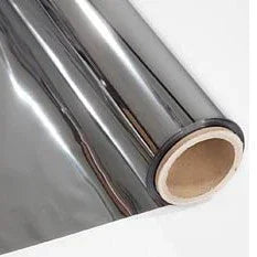 When looking at a large area, the emissivity of various surfaces must be considered. Most materials found on the surface of