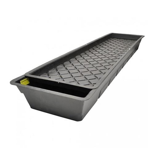 Gray plastic trough with textured bottom on a white background