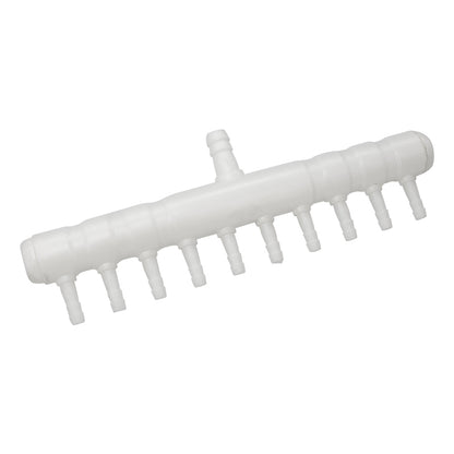 White plastic tool with multiple prongs on a white background