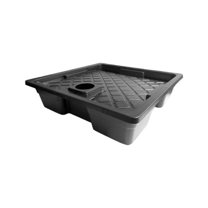 Black plastic tray with drainage holes on a white background