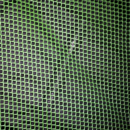 Close-up of green plastic hydroponic grow netting for plant support
