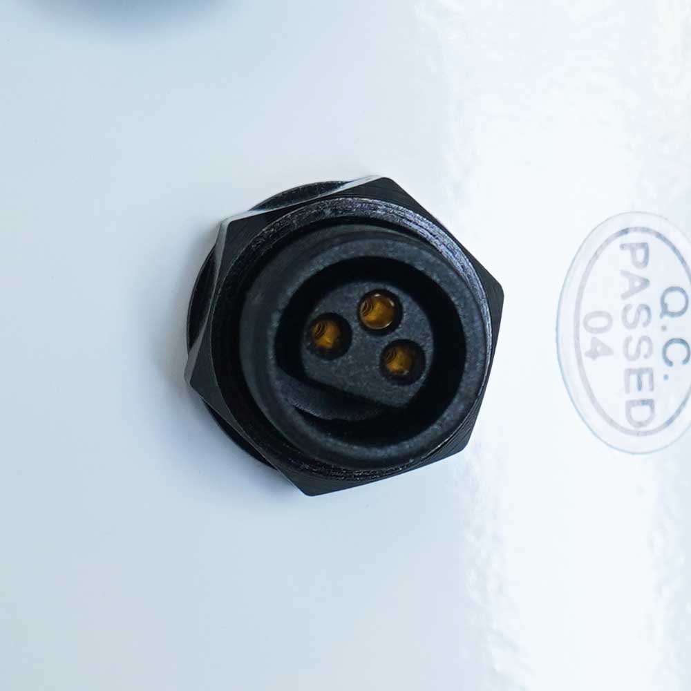 Black connector with three pins on a white background with 'Q.C. Passed' stamp.